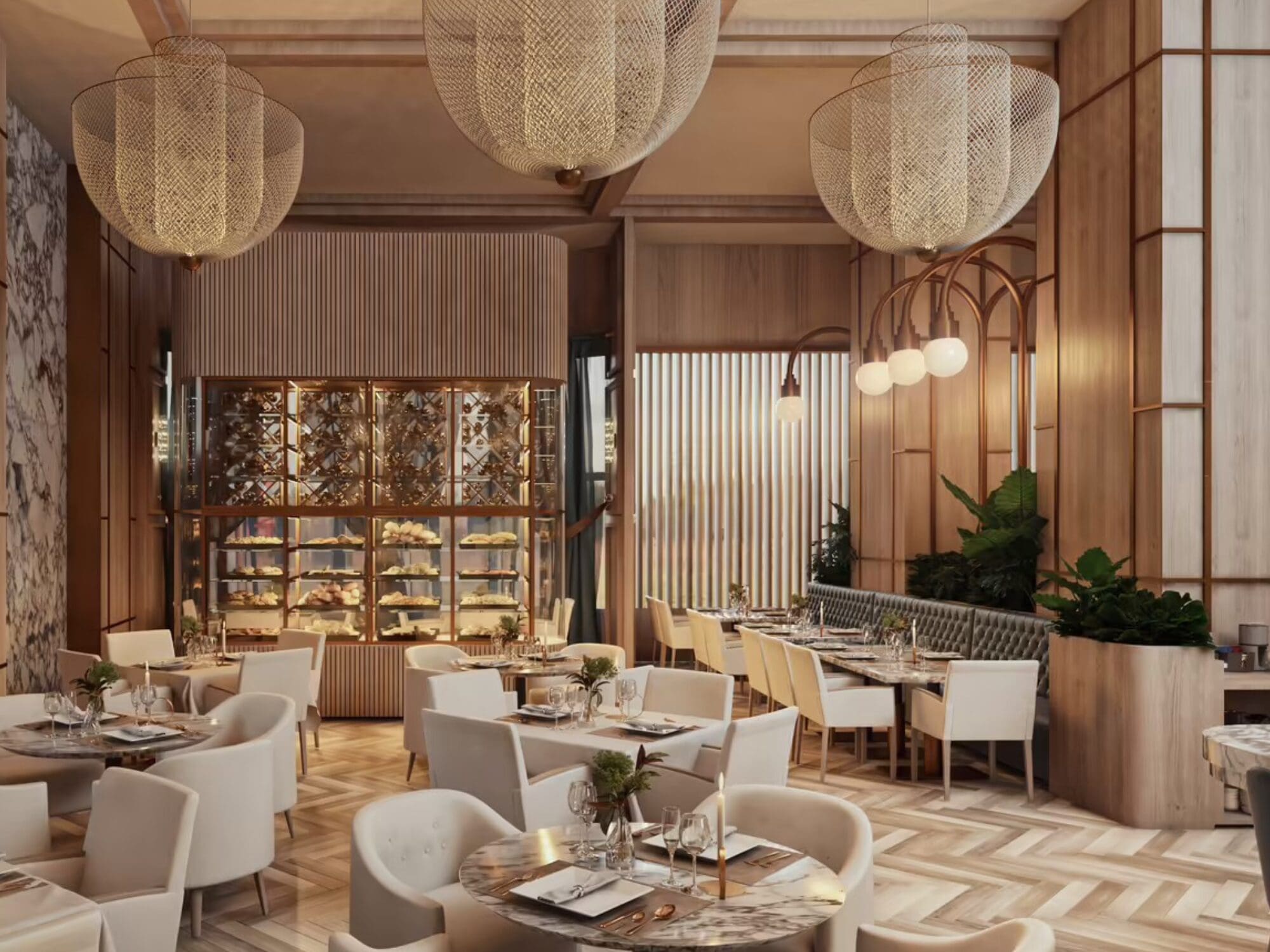 Elegant restaurant interior with round tables and cushioned chairs in a neutral color palette. Large, woven light fixtures hang from the ceiling. Decorative plants and a patterned floor add to the chic ambiance.
