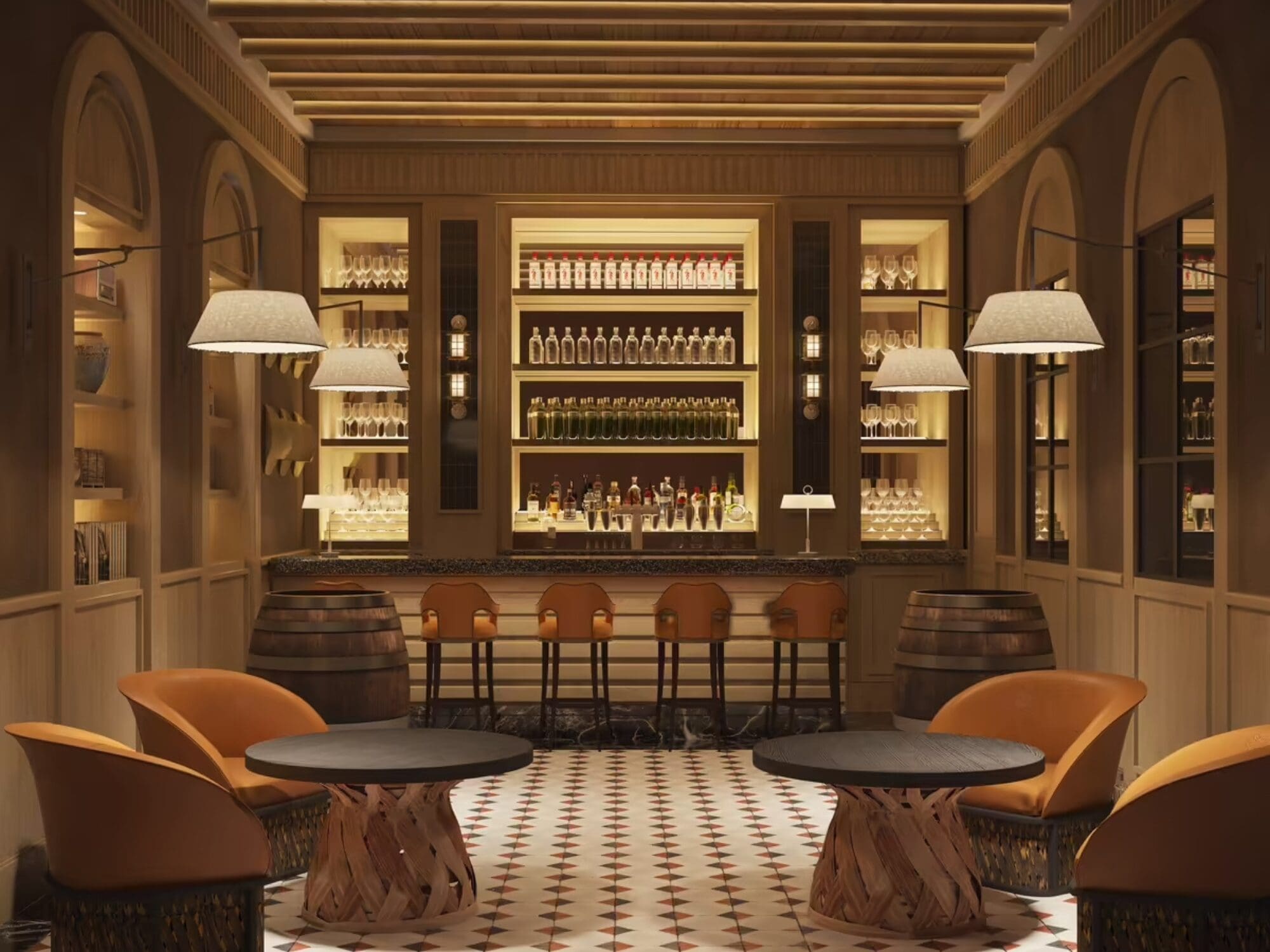 Cozy bar interior with warm lighting, wooden ceiling beams, and arched wall decor. A well-stocked bar with bottles is in the background, and modern orange chairs surround dark round tables on a checkered floor. Hanging lamps provide soft light.