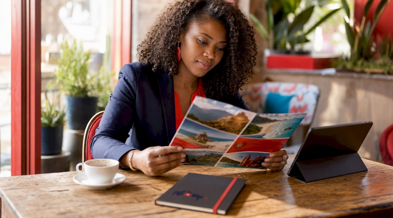 hr manager reviewing travel rewards package