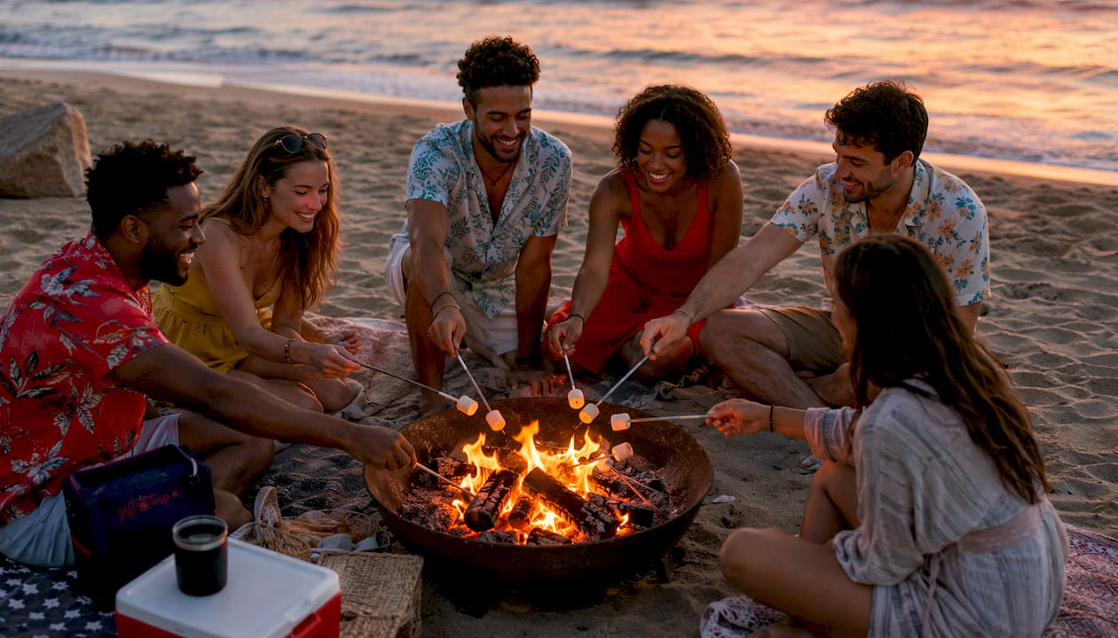 why personalize employee rewards: travel gifts that retain 4 employees walking on beach enjoying travel reward