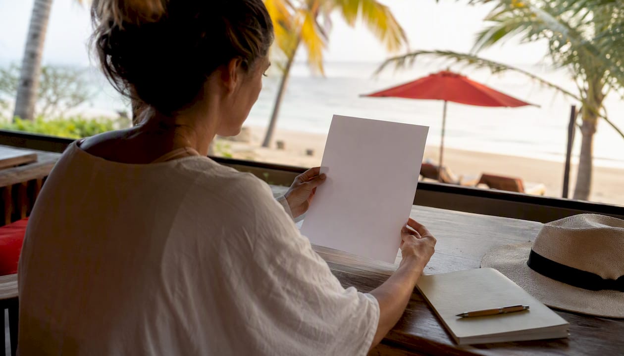 person holding blank official travel sweepstakes rules